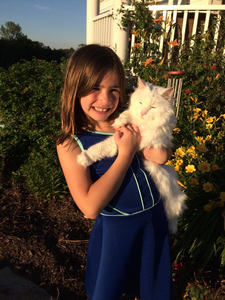 Mishicot Veterinary Clinic - Photo of Girl with White Cat