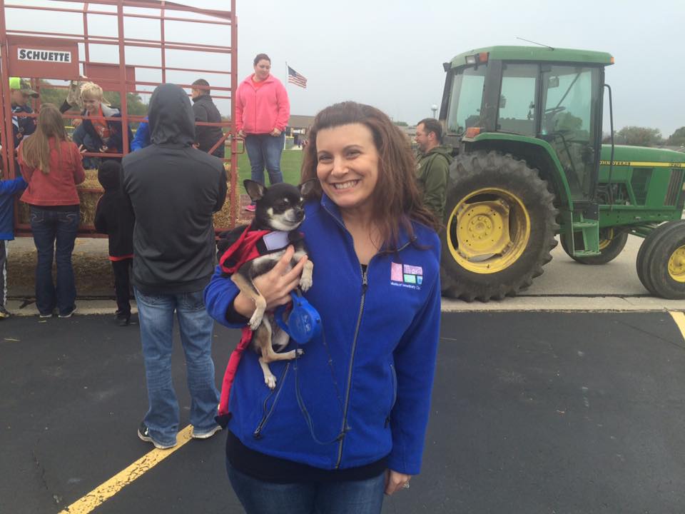 Mishicot Veterinary Clinic - Photo of Staff with Puppy and Tractor Event